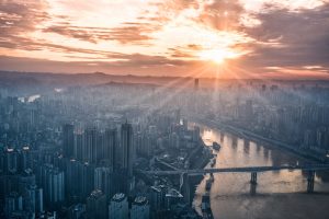 Sun over city