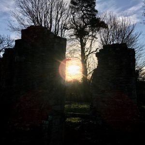 Sun setting on ruins
