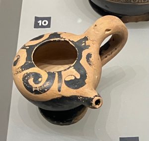 A thelastron, or nursing milk jug, in the museum of ancient Corinth.